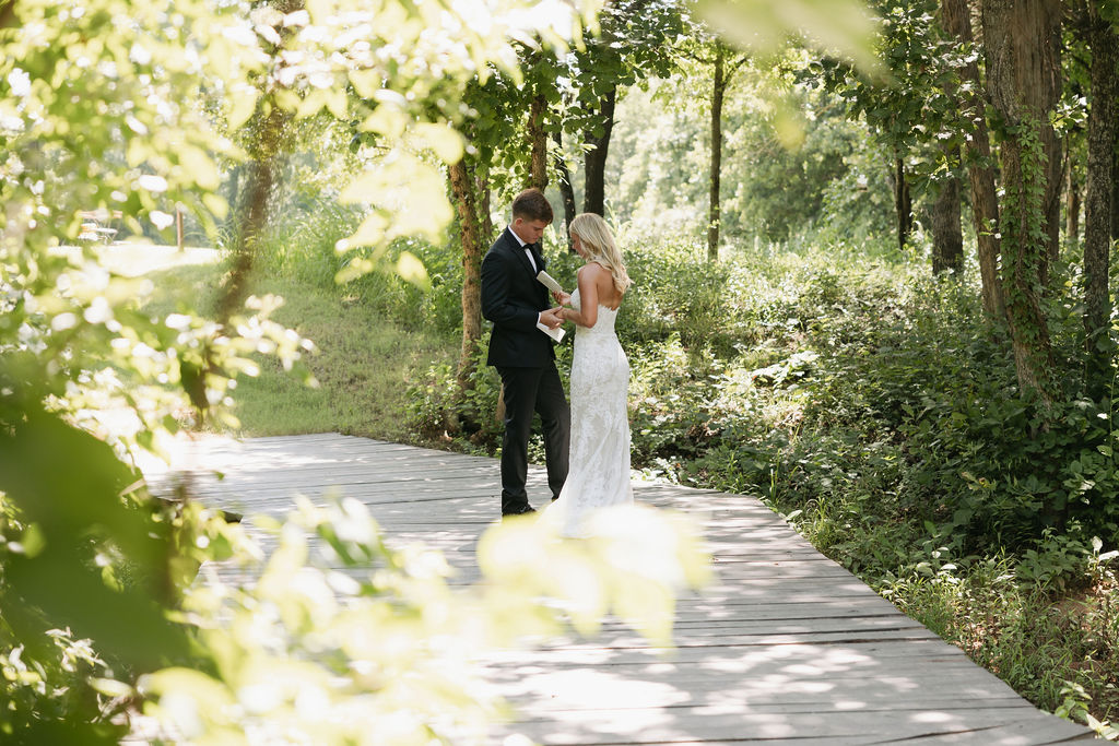 Christian Wedding Couple Exchanging Vows before the Christian wedding ceremony outside